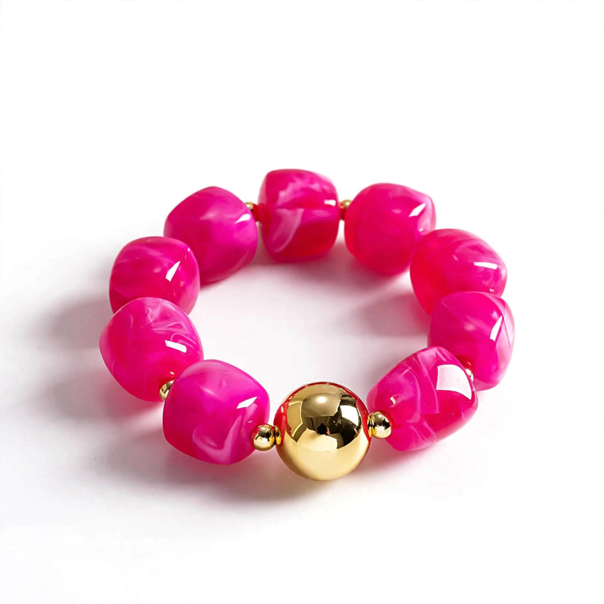 Pink marbled chunky bead bracelet with gold-tone focal accent