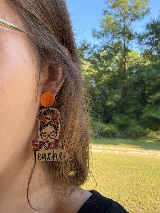 Spooky Teacher earring worn close-up side view