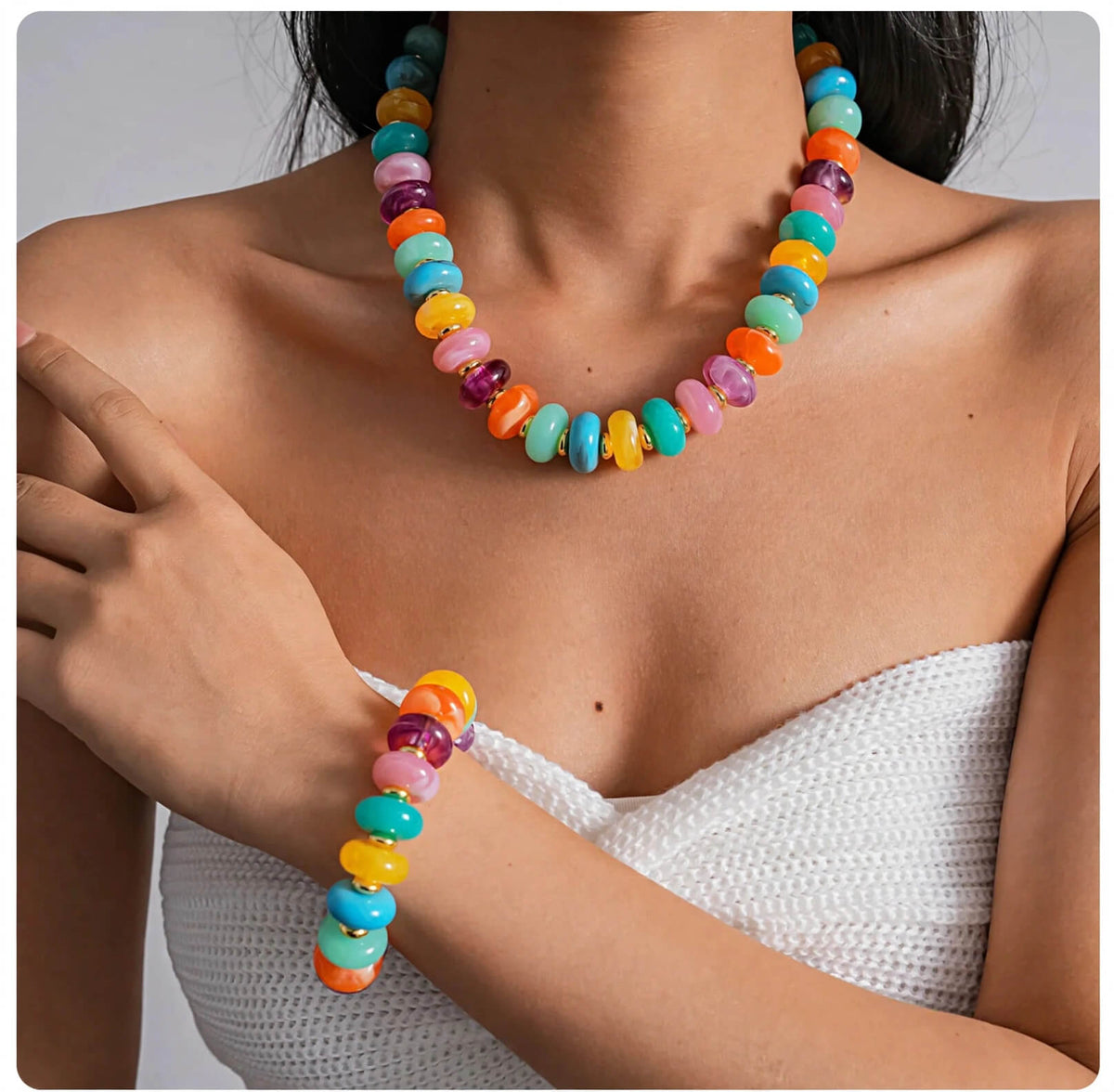 Multicolor rondelle bead necklace and bracelet shown worn together