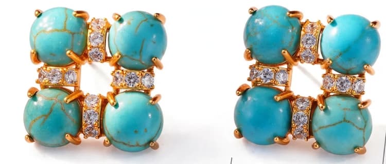 Turquoise-blue square stud earrings with clear rhinestones and gold-colored trim.