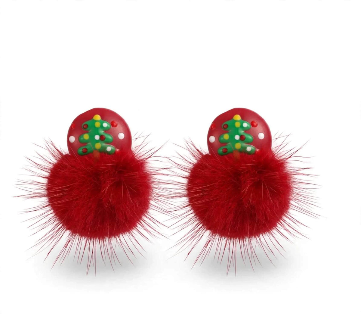 A pair of red pom-pom earrings with a glossy red top disc featuring a small green Christmas tree design, shown on a plain white background.