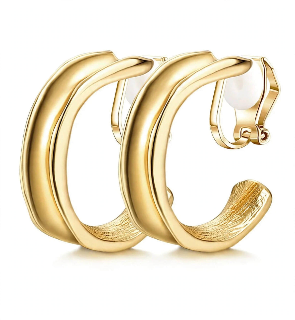 Gold-colored sculpted C-shape earrings with textured detailing and clip-on closures