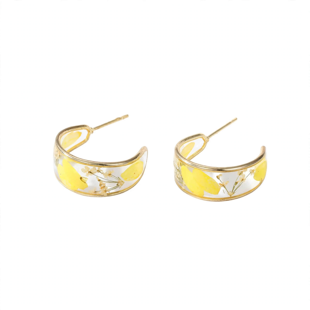 Yellow dried flowers set in clear resin huggie earrings with gold-colored accents.