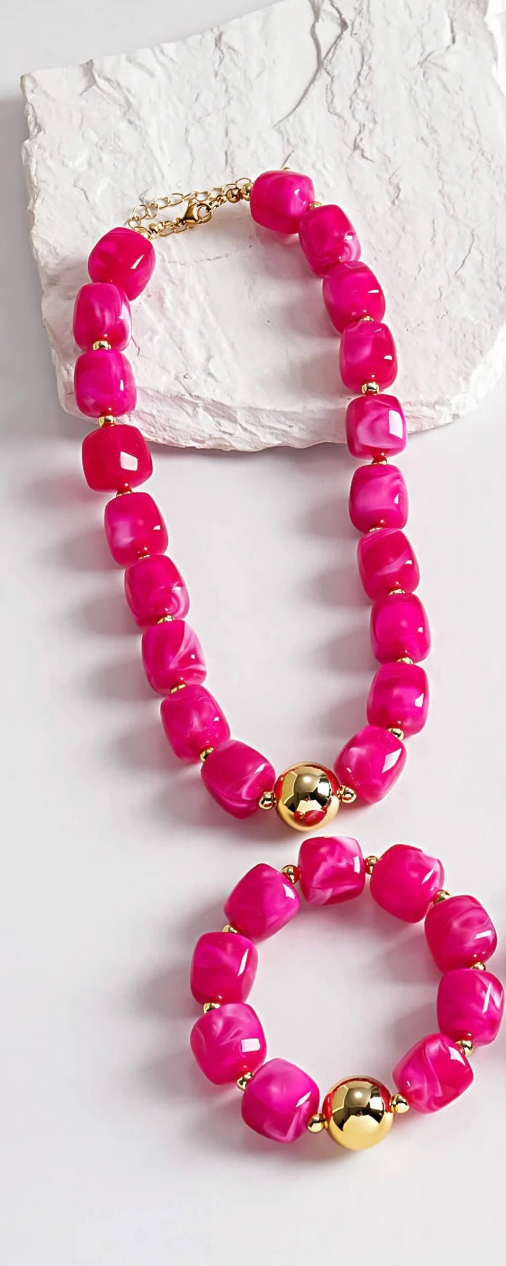 Pink chunky bead necklace and bracelet set with gold-tone accents