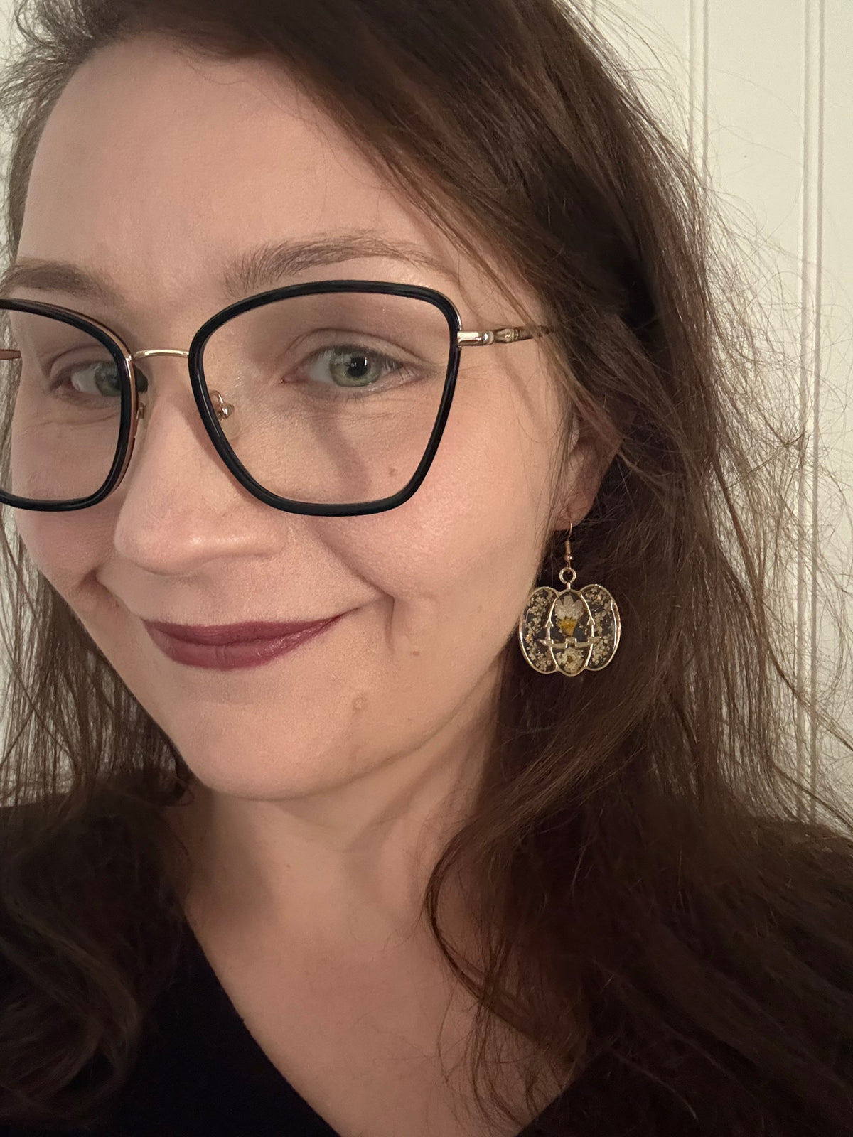 Halloween Pressed Flower Pumpkin Earrings modeled lifestyle shot